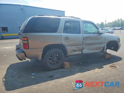 Trzecie zdjęcie samochodu z tyłu: 2003 GMC YUKON DENALI VIN:1GKEK63U73J170358 - miniatura