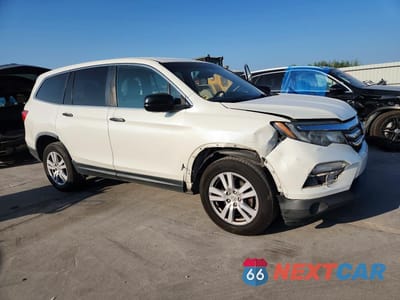 Czwarte zdjęcie samochodu z boku: 2018 HONDA PILOT LX VIN:5FNYF5H16JB010773 - miniatura