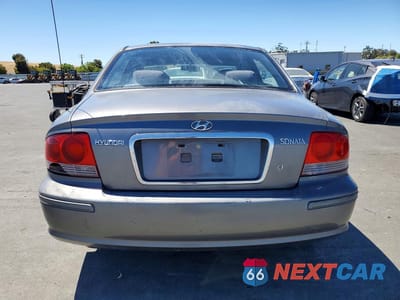 Zdjęcie 6 z 12 samochodu: 2002 HYUNDAI SONATA GL VIN:KMHWF25S12A570807 - miniatura