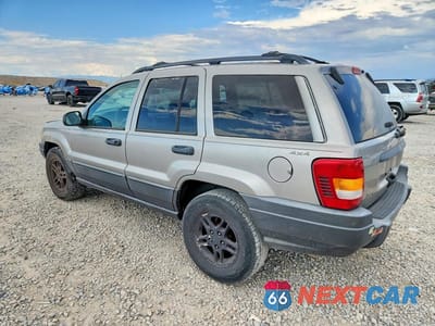 Drugie zdjęcie samochodu z przodu: 2001 JEEP GRAND CHEROKEE LAREDO VIN:1J4GW48S51C599854 - miniatura