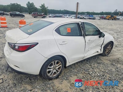 Trzecie zdjęcie samochodu z tyłu: 2017 TOYOTA YARIS IA BASE VIN:3MYDLBYV0HY168891 - miniatura