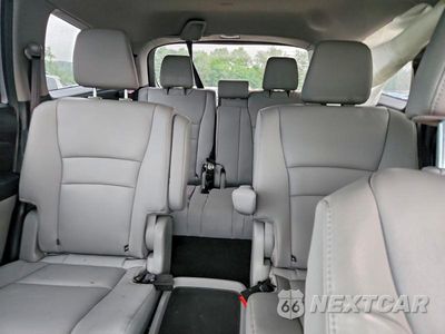 Zdjęcie 10 z 14 samochodu: 2022 HONDA PILOT TOURING VIN:5FNYF6H66NB094925 - miniatura