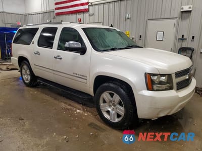 Czwarte zdjęcie samochodu z boku: 2010 CHEVROLET SUBURBAN K1500 LTZ VIN:1GNUKKE36AR268050 - miniatura