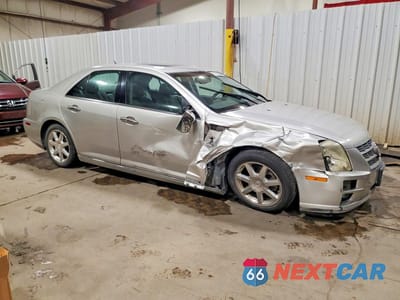 Czwarte zdjęcie samochodu z boku: 2008 CADILLAC STS VIN:1G6DC67A080120325 - miniatura
