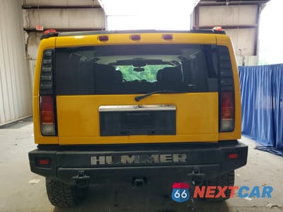 Zdjęcie 6 z 13 samochodu: 2003 HUMMER H2 VIN:5GRGN23U83H141588 - miniatura