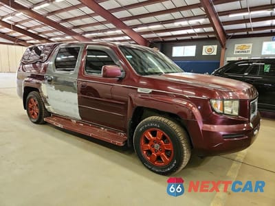 Czwarte zdjęcie samochodu z boku: 2007 HONDA RIDGELINE RTX VIN:2HJYK16387H521232 - miniatura