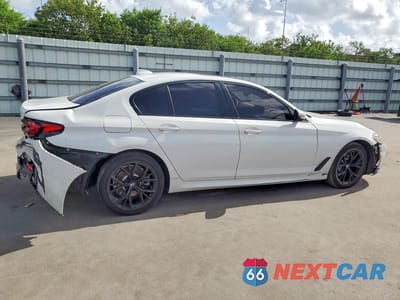 Trzecie zdjęcie samochodu z tyłu: 2021 BMW 530E VIN:WBA13AG04MCH28187 - miniatura