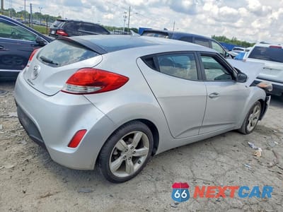 Trzecie zdjęcie samochodu z tyłu: 2012 HYUNDAI VELOSTER BASE VIN:KMHTC6AD1CU042355 - miniatura