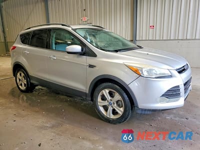 Czwarte zdjęcie samochodu z boku: 2014 FORD ESCAPE SE VIN:1FMCU9GX7EUA49362 - miniatura