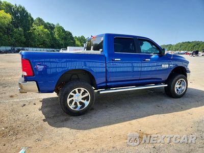 Trzecie zdjęcie samochodu z tyłu: 2018 RAM 1500 SLT VIN:1C6RR7LT0JS190410 - miniatura
