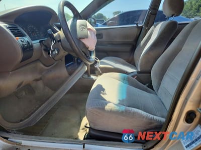 Zdjęcie 7 z 12 samochodu: 1997 TOYOTA COROLLA DX VIN:2T1BB02E7VC193935 - miniatura
