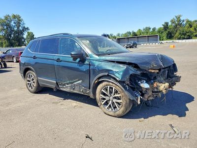 Czwarte zdjęcie samochodu z boku: 2018 VOLKSWAGEN TIGUAN SE VIN:3VV2B7AX3JM219753 - miniatura