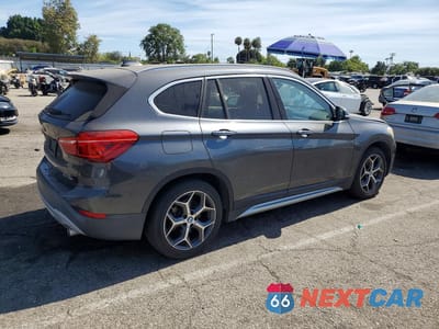 Trzecie zdjęcie samochodu z tyłu: 2019 BMW X1 XDRIVE28I VIN:WBXHT3C59K5L89166 - miniatura
