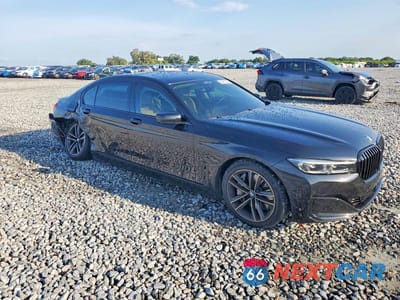Czwarte zdjęcie samochodu z boku: 2021 BMW 750 XI VIN:WBA7U2C04MCE61507 - miniatura
