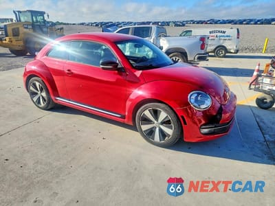 Czwarte zdjęcie samochodu z boku: 2012 VOLKSWAGEN BEETLE TURBO VIN:3VWVA7AT9CM607131 - miniatura