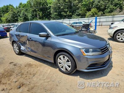 Czwarte zdjęcie samochodu z boku: 2017 VOLKSWAGEN JETTA S VIN:3VW2B7AJ9HM311290 - miniatura