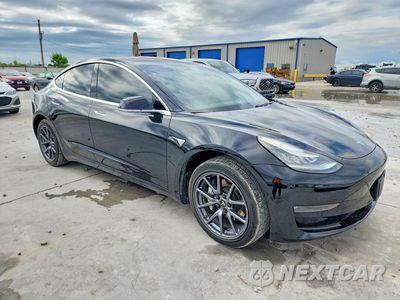 Czwarte zdjęcie samochodu z boku: 2019 TESLA MODEL 3 VIN:5YJ3E1EA9KF296341 - miniatura