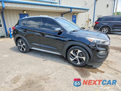 Czwarte zdjęcie samochodu z boku: 2018 HYUNDAI TUCSON SPORT VIN:KM8J33AL4JU817855 - miniatura