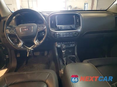Zdjęcie 8 z 12 samochodu: 2021 GMC CANYON AT4 VIN:1GTG6FEN4M1106665 - miniatura