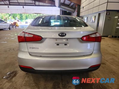 Zdjęcie 6 z 12 samochodu: 2014 KIA FORTE LX VIN:KNAFX4A64E5220894 - miniatura