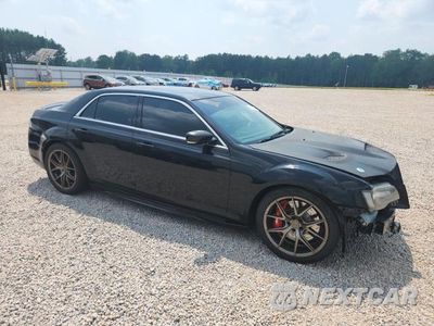 Czwarte zdjęcie samochodu z boku: 2012 CHRYSLER 300 SRT-8 VIN:2C3CCAFJ1CH801485 - miniatura