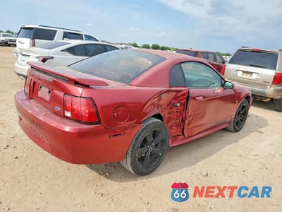 Trzecie zdjęcie samochodu z tyłu: 2003 FORD MUSTANG 2DR VIN:1FAFP40453F339019 - miniatura