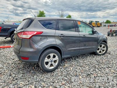 Trzecie zdjęcie samochodu z tyłu: 2016 FORD ESCAPE SE VIN:1FMCU0G77GUA77001 - miniatura