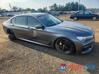 Czwarte zdjęcie samochodu z boku: 2017 BMW 740 I VIN:WBA7E2C58HG740107 - miniatura