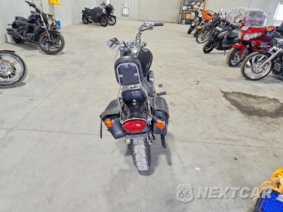 Czwarte zdjęcie samochodu z boku: 1996 KAWASAKI VN800 VIN:JKBVNCA14TA032616 - miniatura