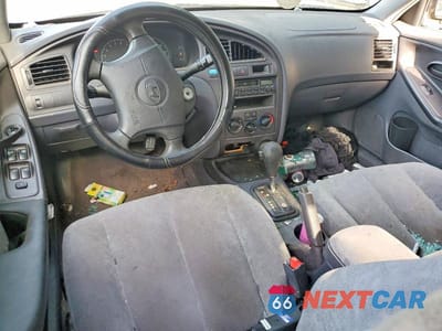 Zdjęcie 8 z 12 samochodu: 2002 HYUNDAI ELANTRA GLS VIN:KMHDN45D92U283821 - miniatura