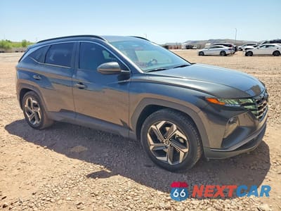 Czwarte zdjęcie samochodu z boku: 2022 HYUNDAI TUCSON SEL VIN:5NMJC3AE5NH001322 - miniatura