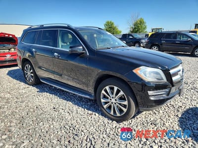 Czwarte zdjęcie samochodu z boku: 2013 MERCEDES-BENZ GL 450 4MATIC VIN:4JGDF7CE9DA249523 - miniatura