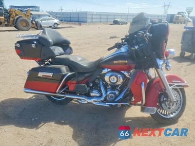 2010 HARLEY-DAVIDSON FLHTK 1HD1KEM31AB639850 - główne zdjęcie licytacji z USA - miniatura