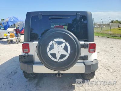 Zdjęcie 6 z 12 samochodu: 2015 JEEP WRANGLER UNLIMITED SAHARA VIN:1C4BJWEG0FL547615 - miniatura