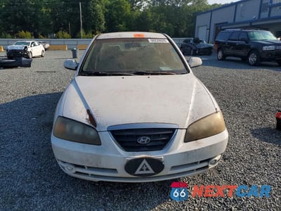 Piąte zdjęcie samochodu w środku: 2004 HYUNDAI ELANTRA GLS VIN:KMHDN46D94U724901 - miniatura