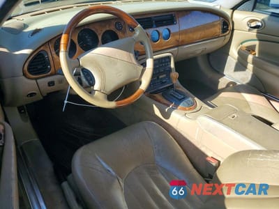 Zdjęcie 8 z 12 samochodu: 1997 JAGUAR XK8 VIN:SAJGX2743VC010088 - miniatura