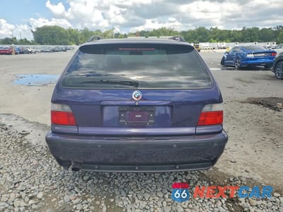 Zdjęcie 6 z 12 samochodu: 1998 BMW 320I VIN:WBACE82040EK61710 - miniatura