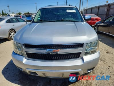 Piąte zdjęcie samochodu w środku: 2011 CHEVROLET TAHOE C1500 LT VIN:1GNSCBE00BR257010 - miniatura