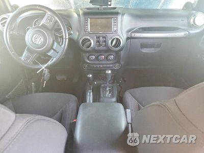 Zdjęcie 8 z 12 samochodu: 2014 JEEP WRANGLER UNLIMITED SPORT VIN:1C4BJWDG6EL208356 - miniatura