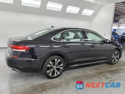 Trzecie zdjęcie samochodu z tyłu: 2021 VOLKSWAGEN PASSAT SE VIN:1VWSA7A30MC001822 - miniatura
