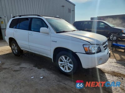 Czwarte zdjęcie samochodu z boku: 2006 TOYOTA HIGHLANDER HYBRID VIN:JTEEW21A560012866 - miniatura