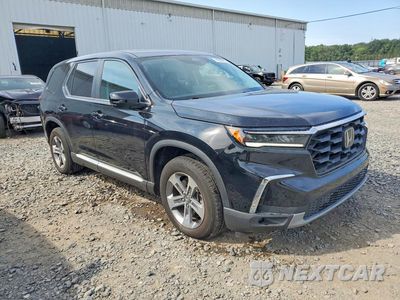 Czwarte zdjęcie samochodu z boku: 2023 HONDA PILOT EXL VIN:5FNYG1H4XPB058432 - miniatura