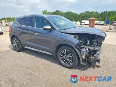 Czwarte zdjęcie samochodu z boku: 2021 HYUNDAI TUCSON LIMITED VIN:KM8J33AL8MU286521 - miniatura
