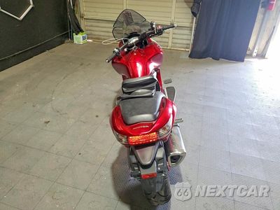 Czwarte zdjęcie samochodu z boku: 2009 HONDA NSA700 A VIN:JH2RC55199K000505 - miniatura