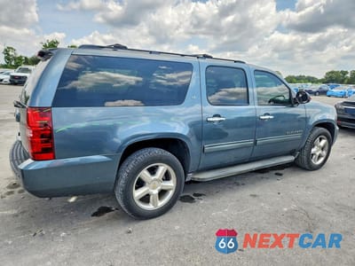 Trzecie zdjęcie samochodu z tyłu: 2010 CHEVROLET SUBURBAN C1500 LT VIN:1GNUCJE0XAR164240 - miniatura