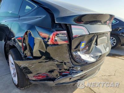 Zdjęcie 9 z 10 samochodu: 2023 TESLA MODEL Y VIN:7SAYGDEEXPF880620 - miniatura
