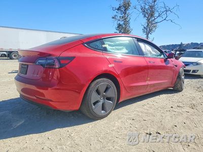 Trzecie zdjęcie samochodu z tyłu: 2021 TESLA MODEL 3 VIN:5YJ3E1EB5MF003045 - miniatura