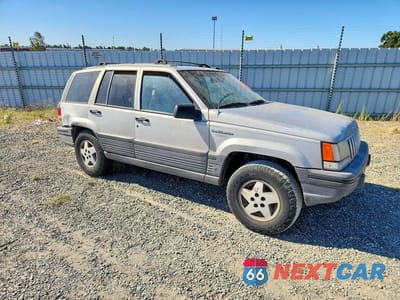 Czwarte zdjęcie samochodu z boku: 1995 JEEP GRAND CHEROKEE LAREDO VIN:1J4GZ58S5SC638375 - miniatura