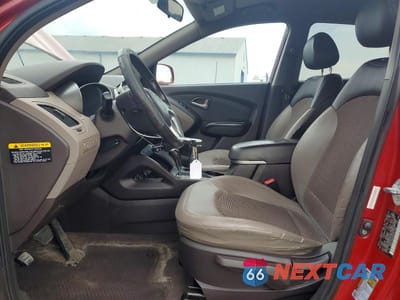 Zdjęcie 7 z 13 samochodu: 2010 HYUNDAI TUCSON GLS VIN:KM8JUCAC6AU021685 - miniatura