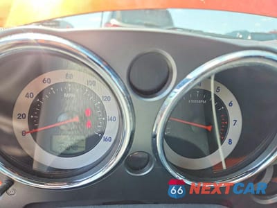 Zdjęcie 9 z 12 samochodu: 2009 MITSUBISHI ECLIPSE SPYDER GS VIN:4A3AL25F29E039948 - miniatura
